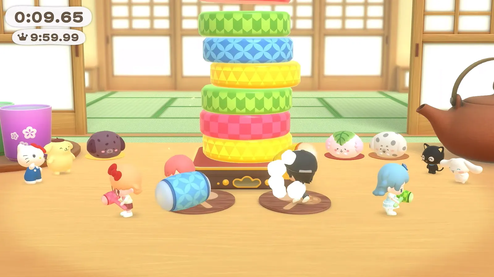 Hello Kitty Party Land minigame in a tatami room with a stack of colored rings and a timer reading 0:09.65 while characters gather around